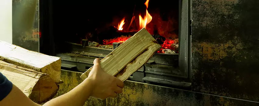 Wood Stove Heat Resistant Wall Repair in Saint Bruno de Montarville, Quebec